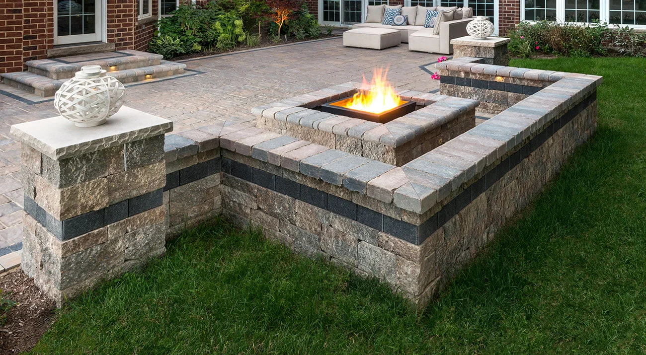 Transforming Outdoor Spaces with Durable Unilock Retaining Walls
