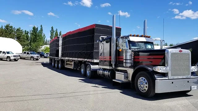How Truck Tarps Protect Loads and Improve Transport Safety